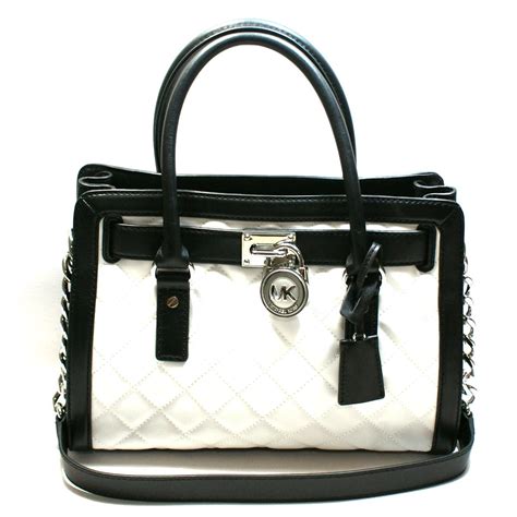 michael kors white and black handbag|michael kors black signature handbag.